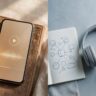 Earbuds and a smartphone sit opposite headphones and a notebook with connecting diagrams.
